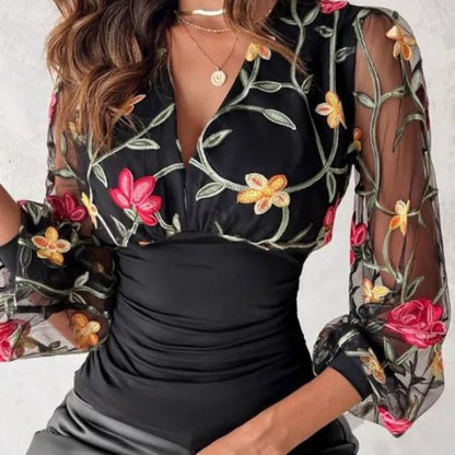 Bluse mit bestickten transparenten Ärmeln